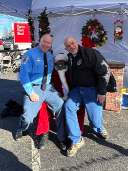  With Commissioner Ostrow and Santa at Holly Days in Lexington Park. 